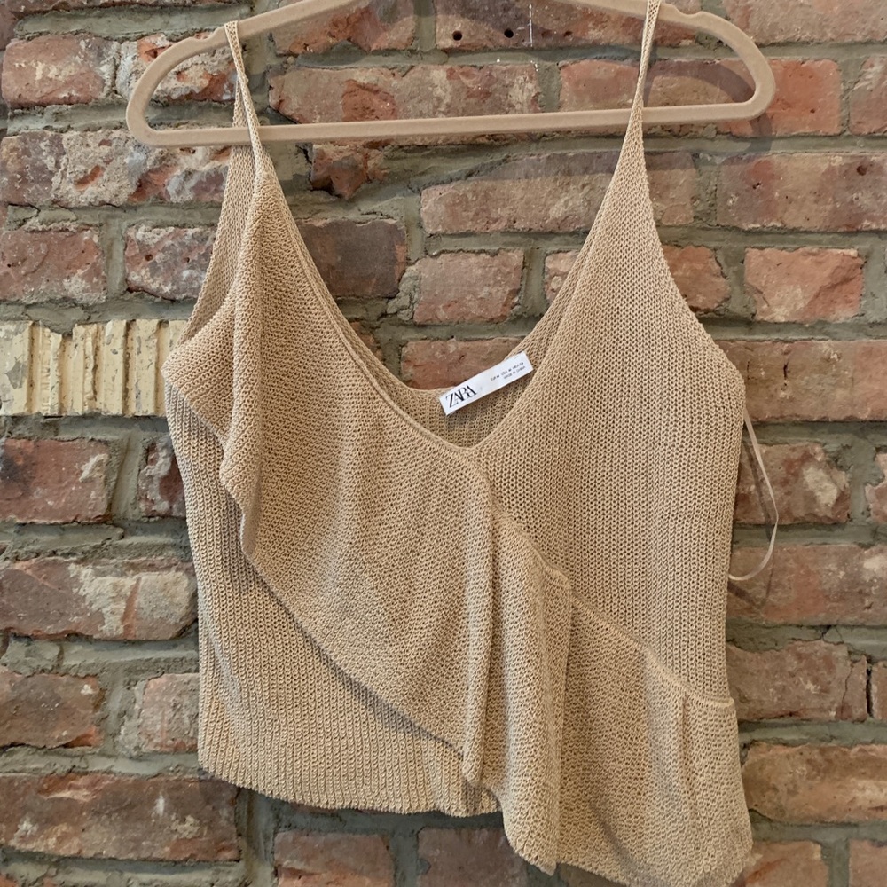 Knit breezy, tank top with split hem and ruffles